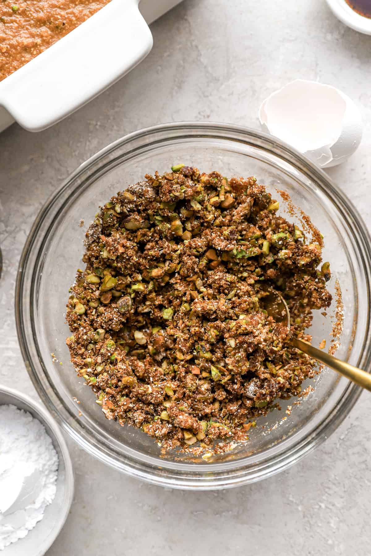 Streusel topping being whisked in a bowl. 
