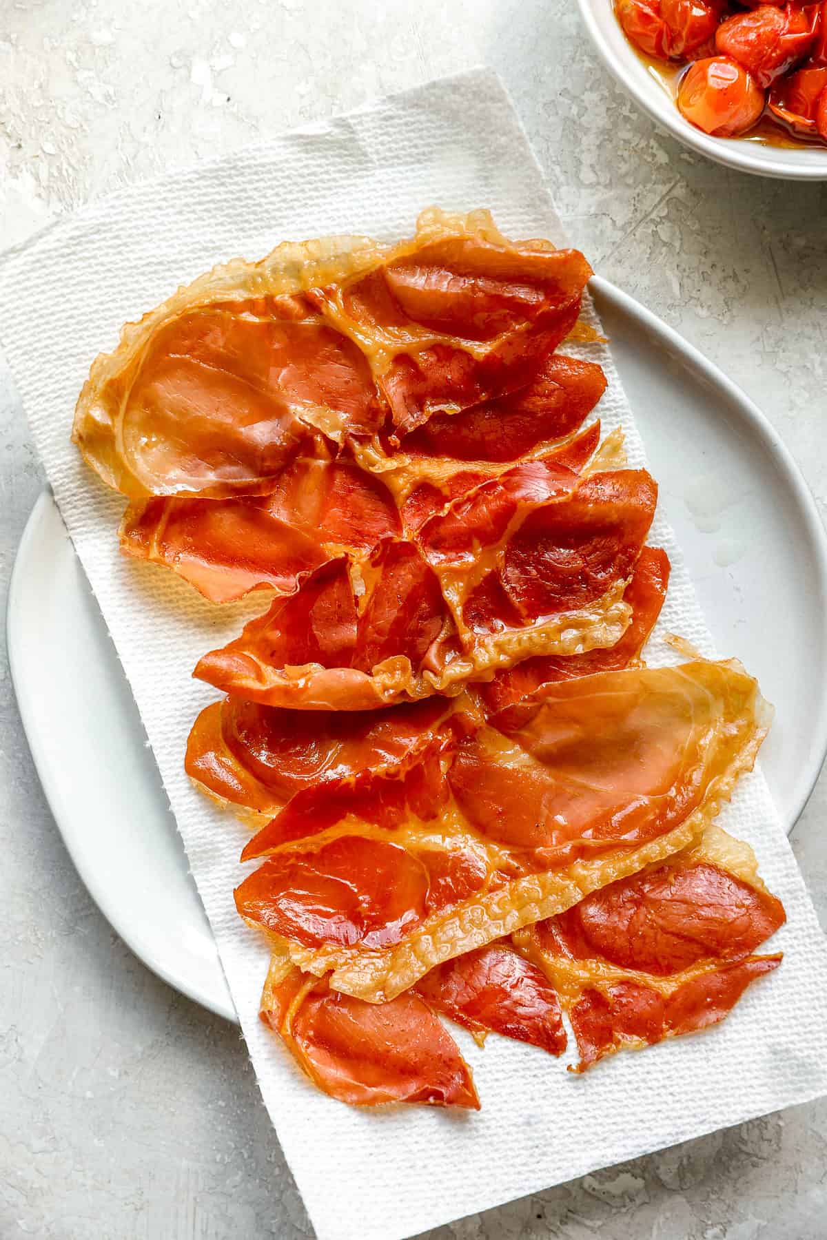 Crispy prosciutto on a plate. 
