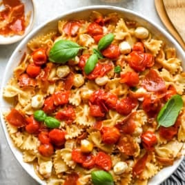 A bowl of caprese pasta salad.