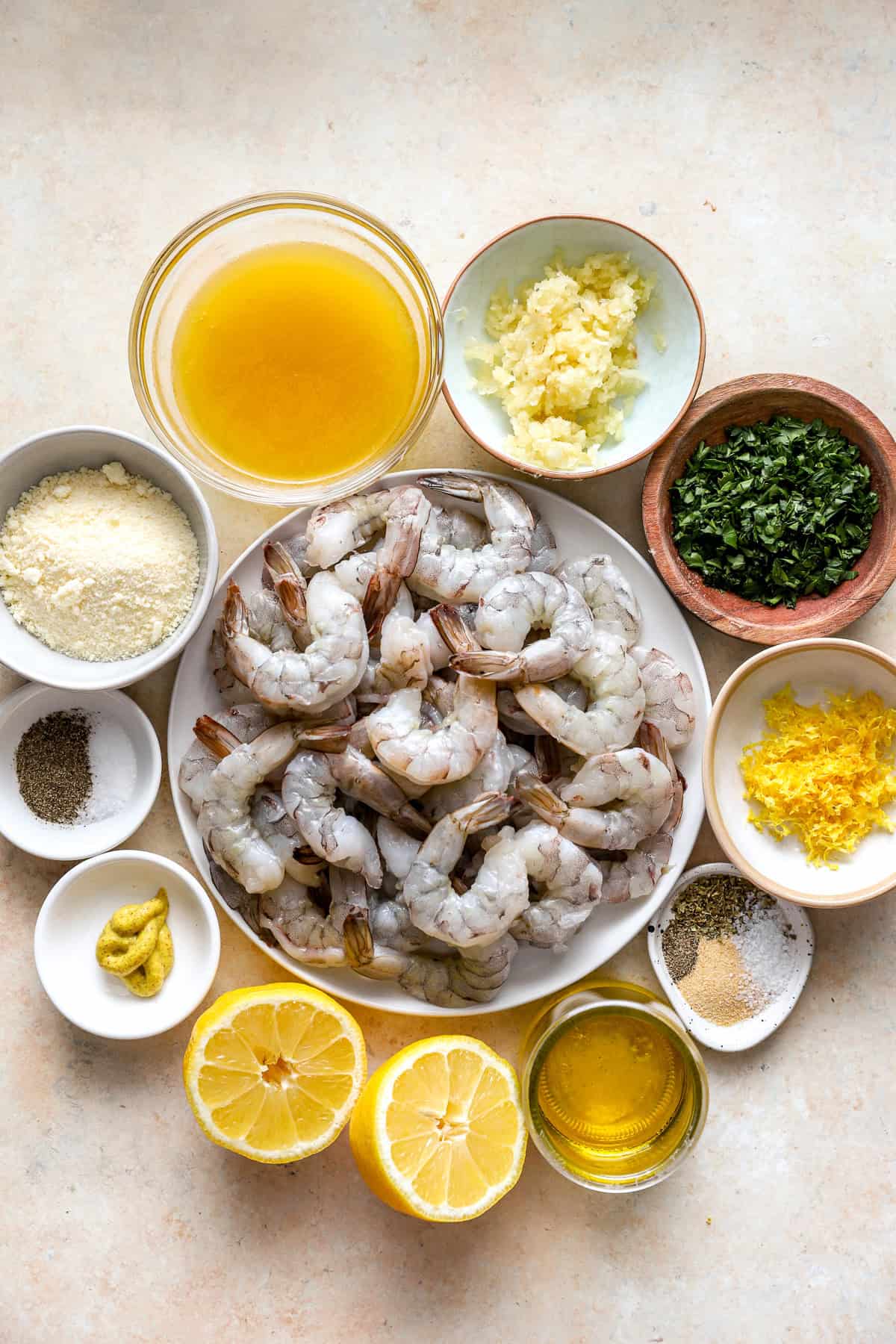 Ingredients to make grilled shrimp skewers with garlic butter. 
