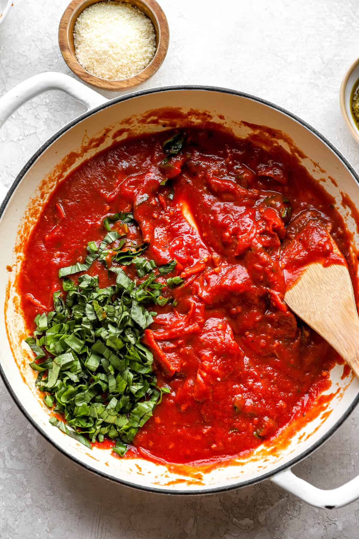 Marinara sauce ingredients being combine in a pot. 