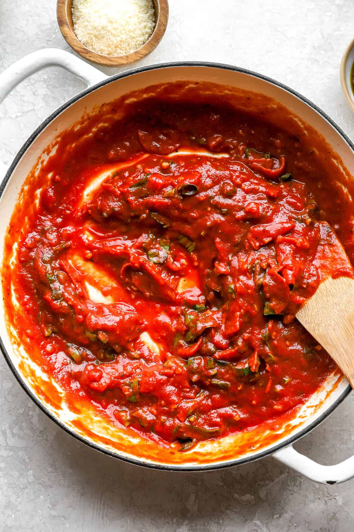 Marinara sauce simmering on the stove. 