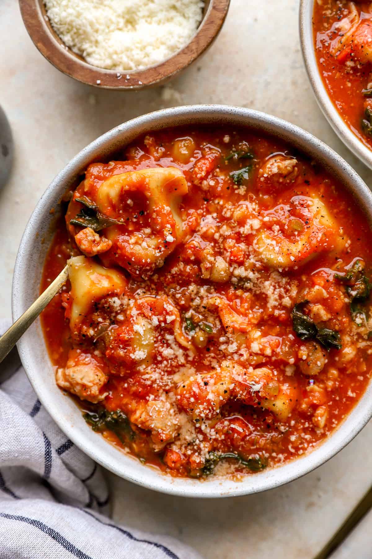 A bowl of Tuscan tortellini soup. 