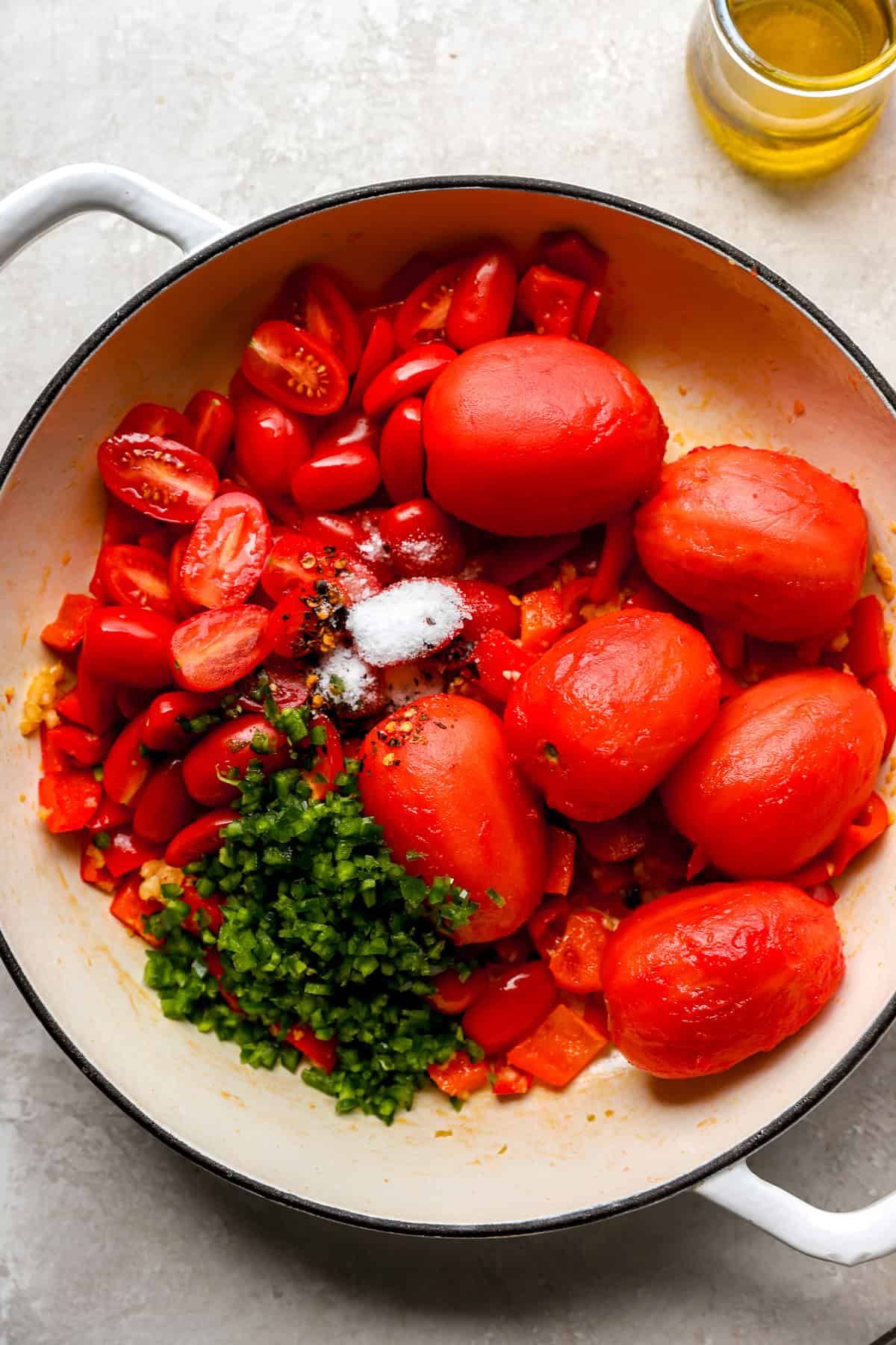 Matbucha ingredients in a skillet.