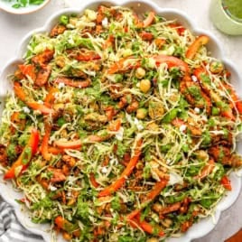 A bowl of meal prep green goddess chicken slaw.