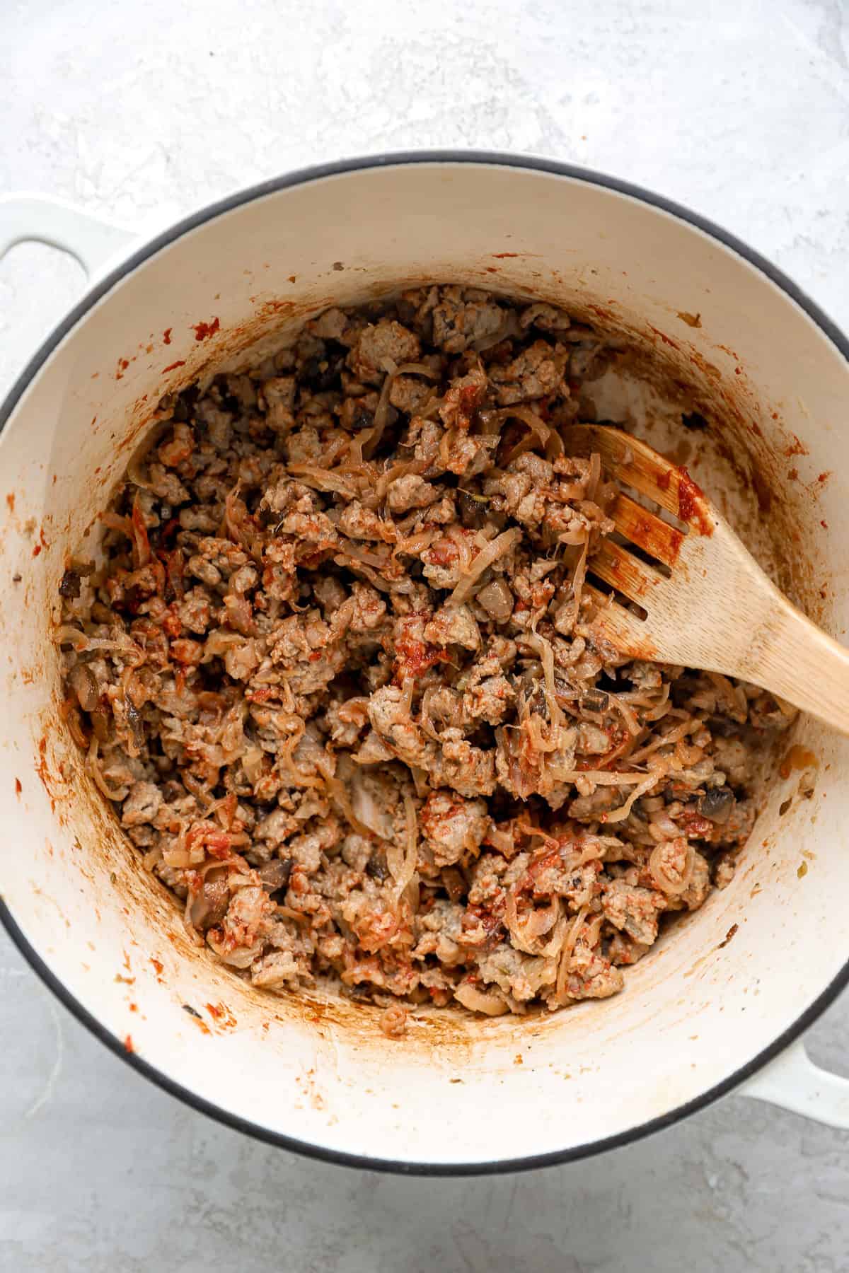 Creamy butter bean ingredients being combined in a pot. 
