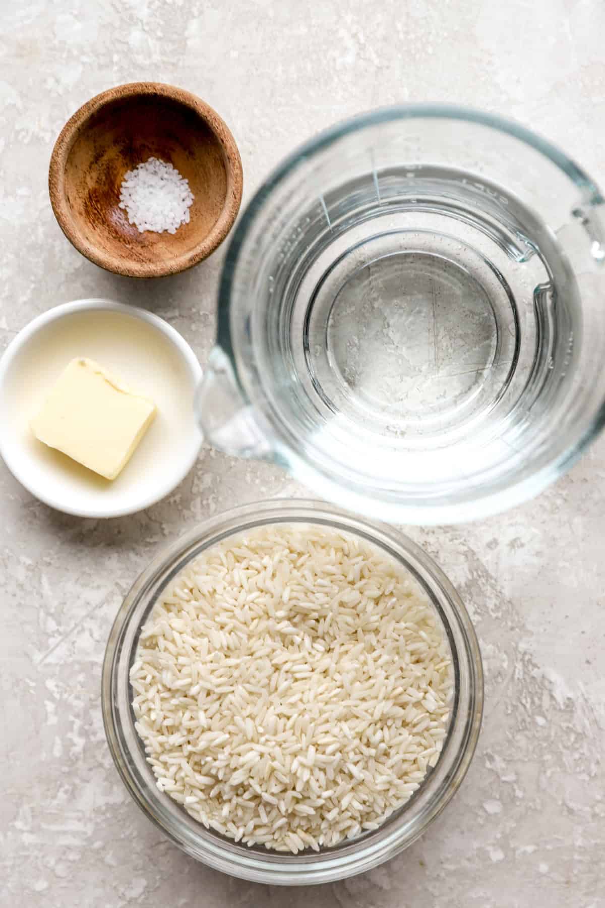 Salt, butter, water, and a bowl of dry white rice. 