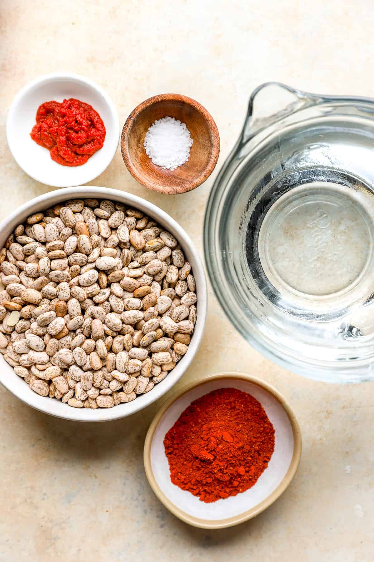 Tomato paste, salt, water, dry pinto beans, and spices.