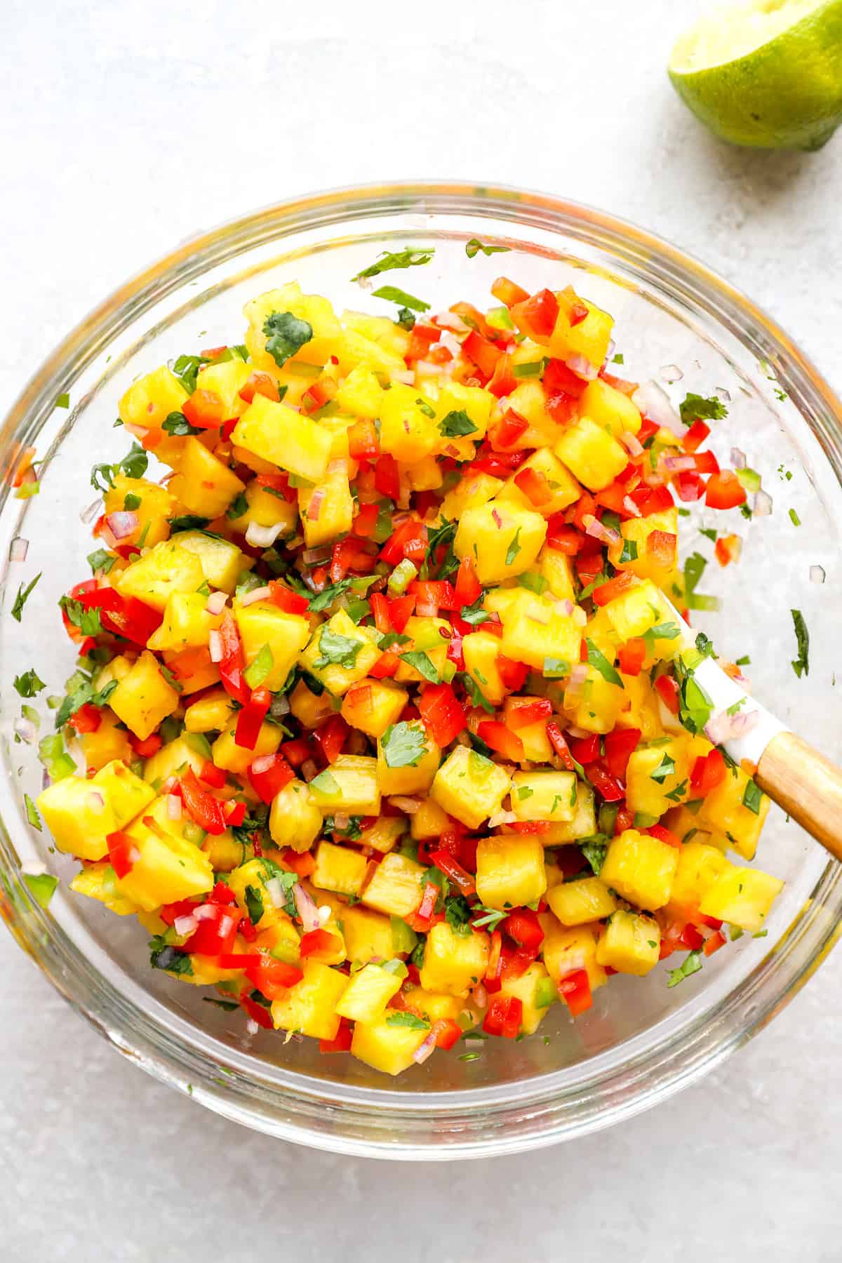 A bowl of pineapple salsa.