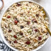 A bowl of classic chicken salad with cranberries.