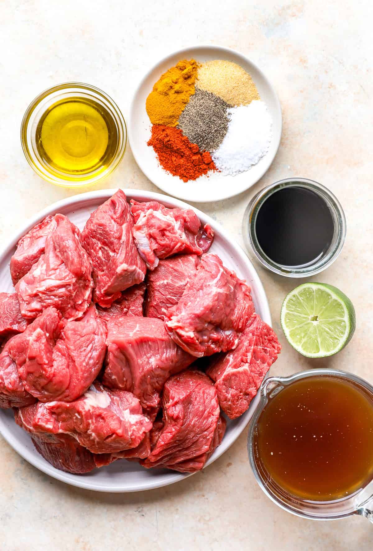 Oil, spices, coconut aminos, lime, beef broth, and beef cubes to make shredded beef.