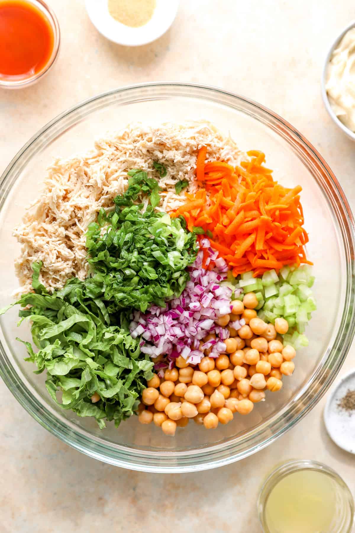 Buffalo chicken salad ingredients in a bowl.