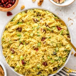 A bowl of curried chicken salad.